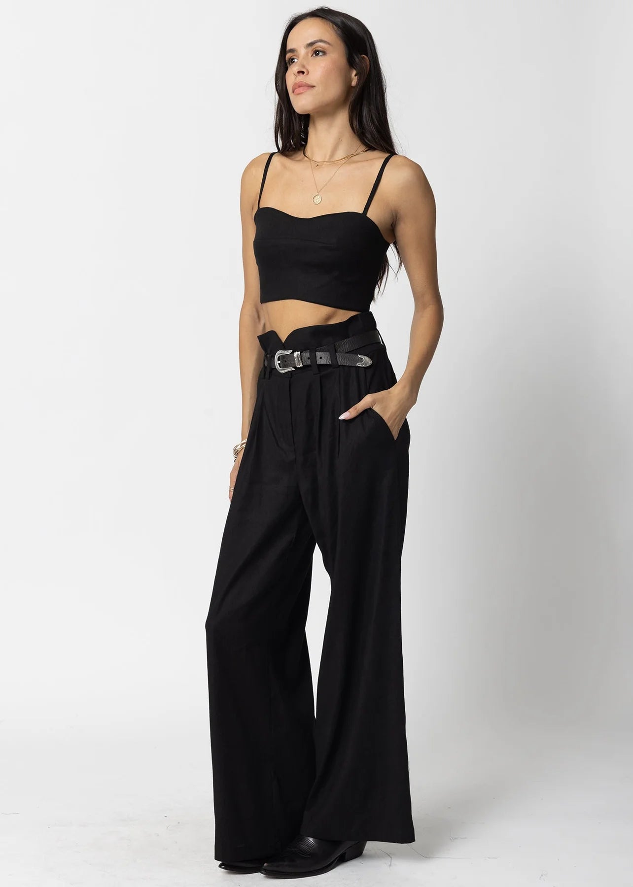 Design detail view of the Black Stretch Linen Knotch Waist Pants by Stillwater