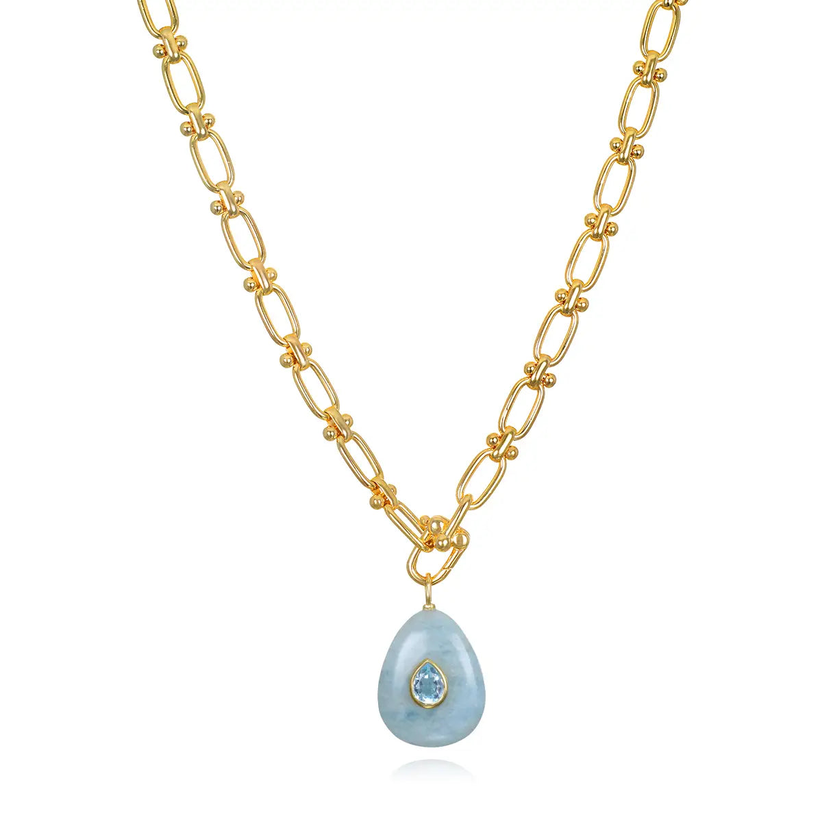 14k gold plated brass chain necklace with bezel set pear charm in aquamarine with sky blue topaz