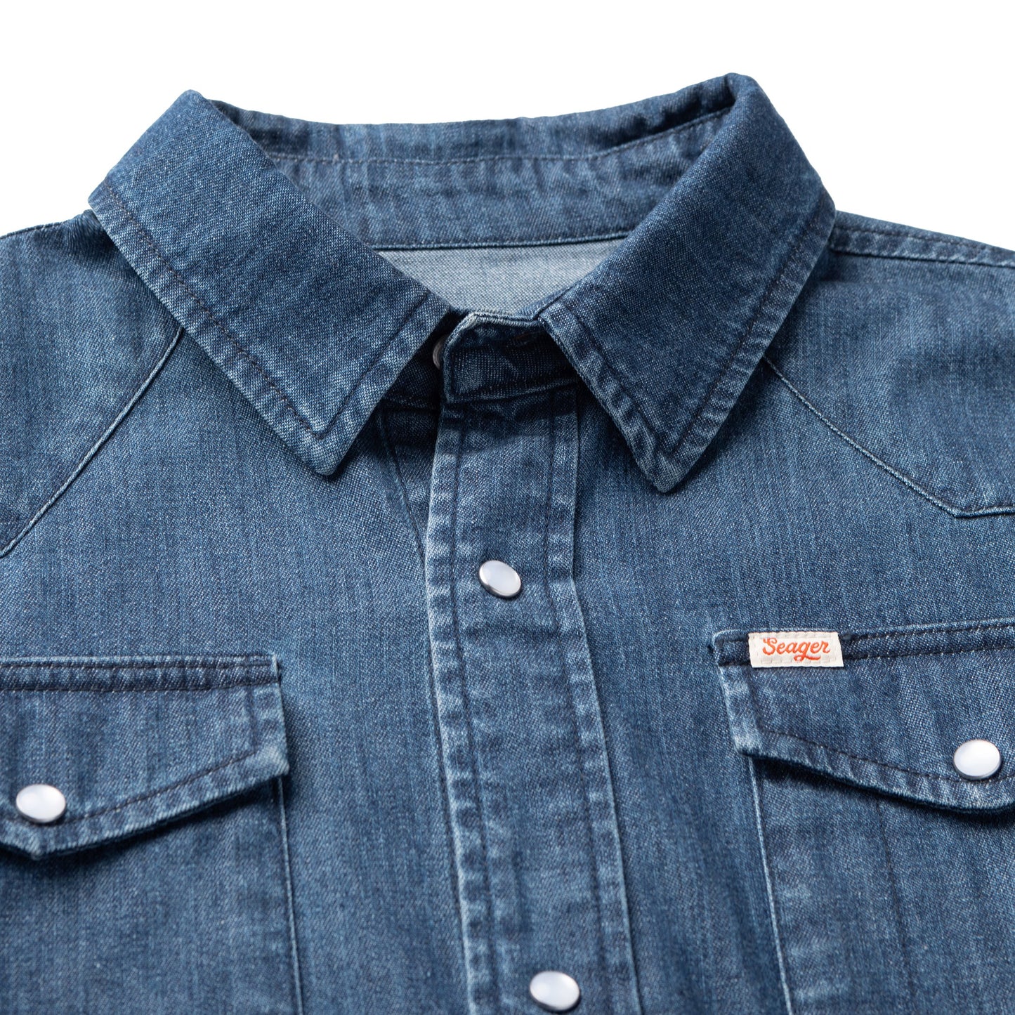 Collar and pearl snap detail on the denim chambray Reagan Pearl Snap Shirt