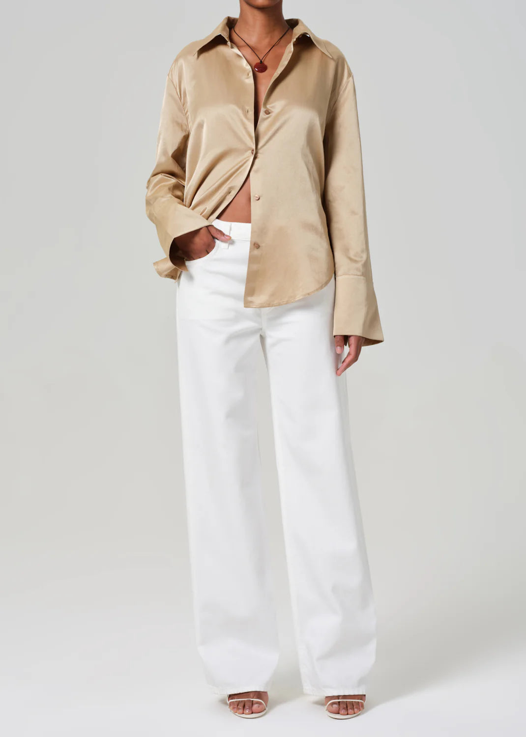 Sitting high on the waist with an easy silhouette, the Annina wide leg jean by Citizens of Humanity is crafted from a rigid recycled cotton blend with a vintage feel. Shop these 33