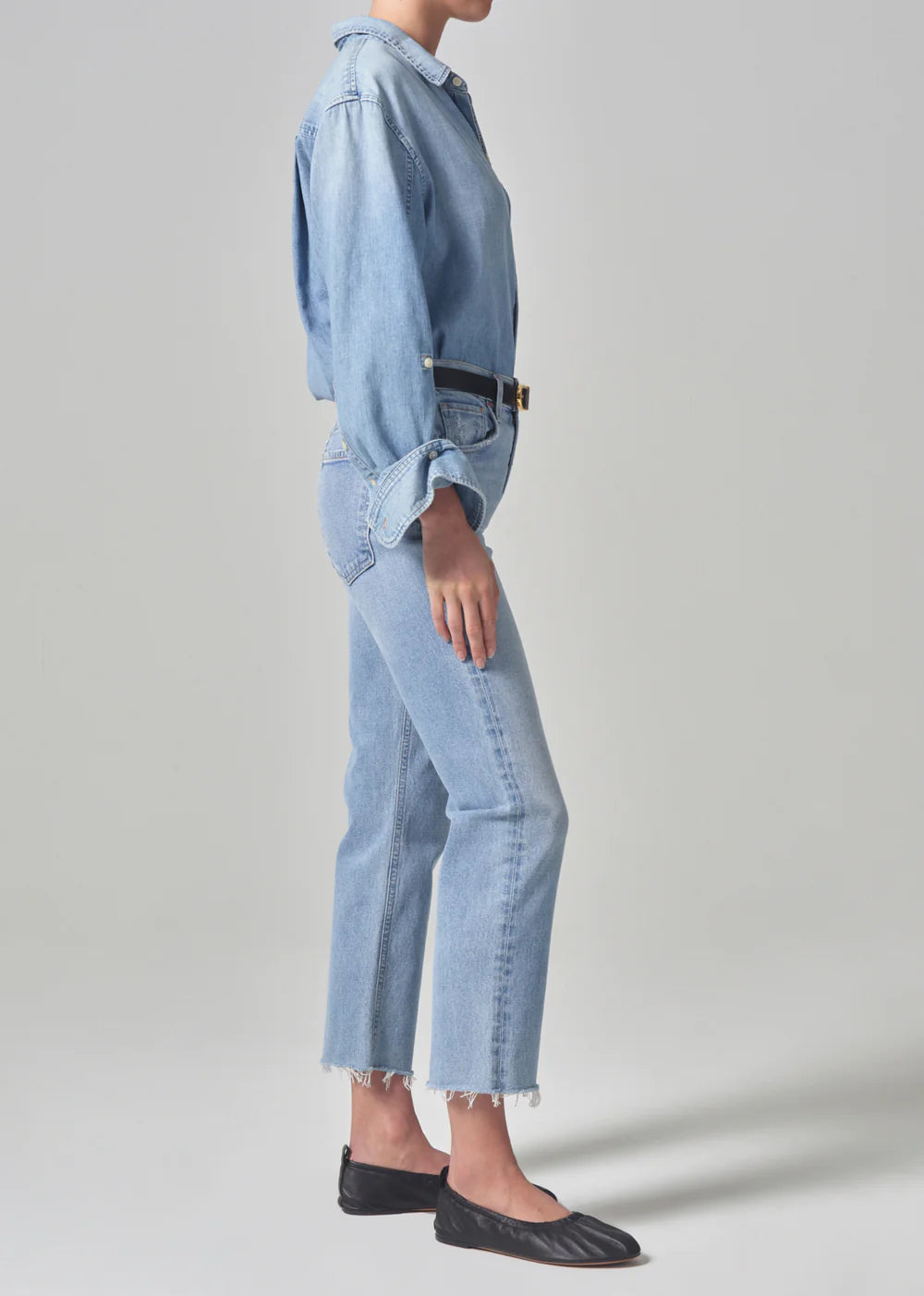 Side view of model wearing the Daphne Crop High Rise Stovepipe jeans in the color Mirage by Citizens of Humanity