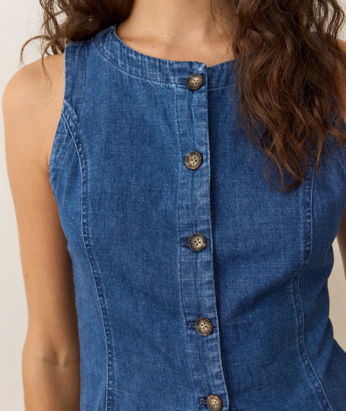 The Marine Layer Charlie Longline Vest features a soft, broken in denim feel
