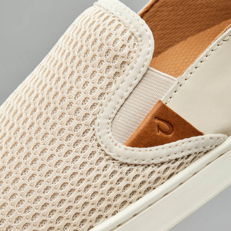 The OluKai Pehuea Women's Slip-On Shoes feature a lightweight and breathable design