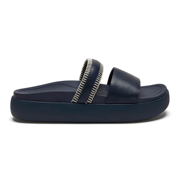 Slide into comfort and versatile summer style with the OluKai Pae Women's Leather Slide Sandals at Harbour Thread women's boutique.