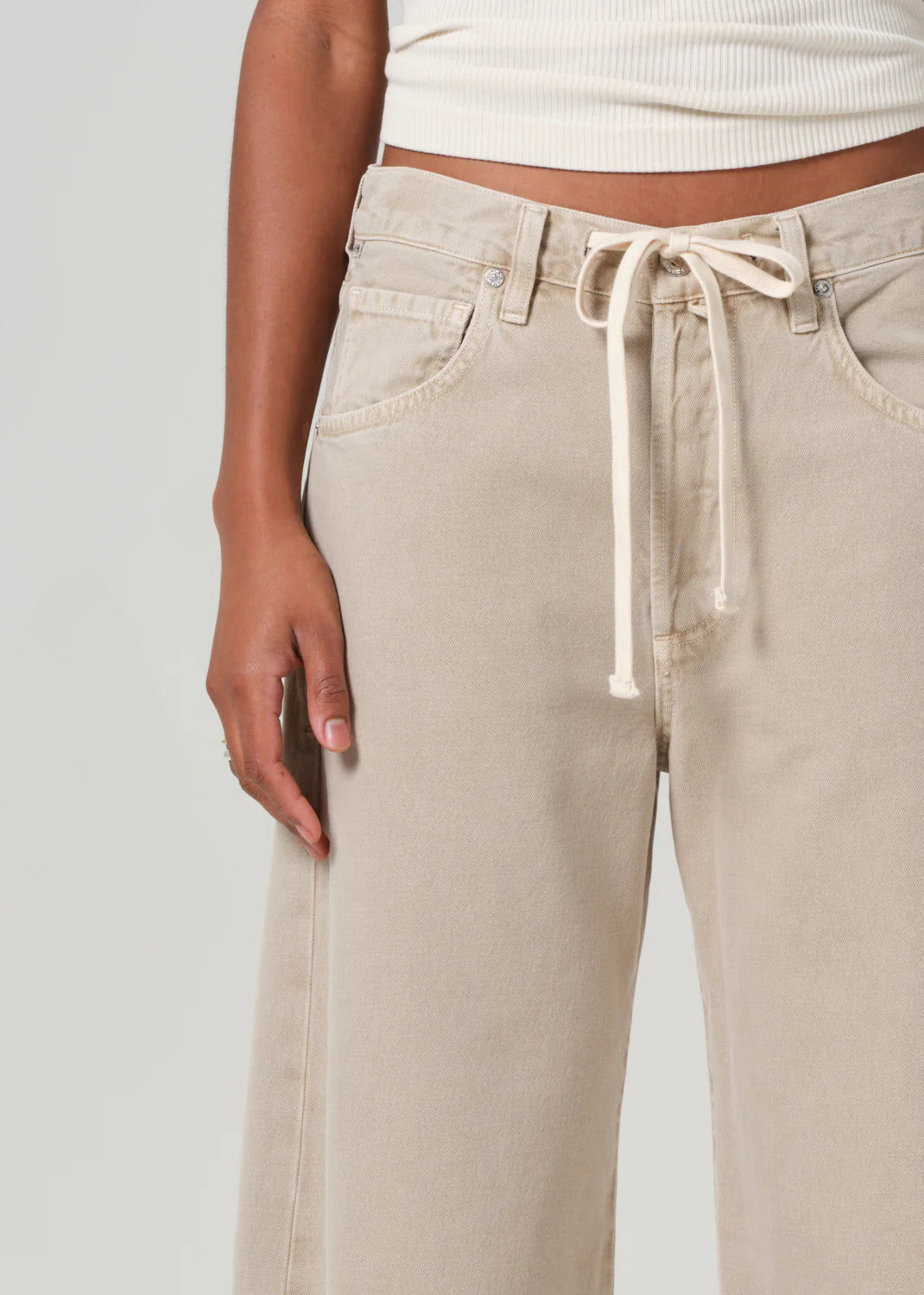 The Citizens Of Humanity Brynn Drawstring Trouser offers a wide leg silhouette with a drawstring waist detail for elevated, yet casual and comfortable style.