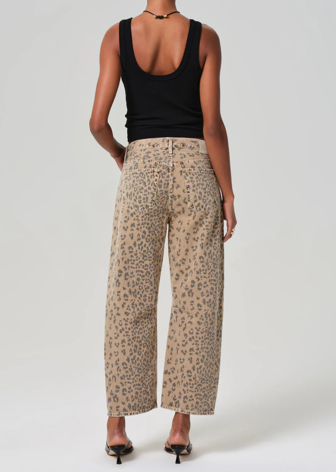 Shop women's trendy cheetah print barrel leg jeans at Harbour Thread boutique