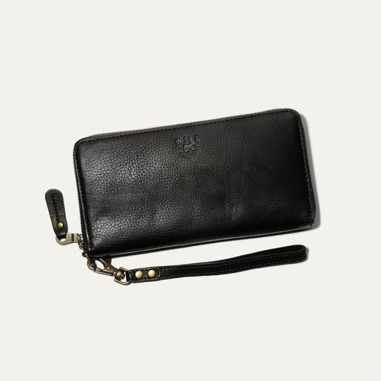 Front of the Will Leather Goods Zip Around Clutch in Black