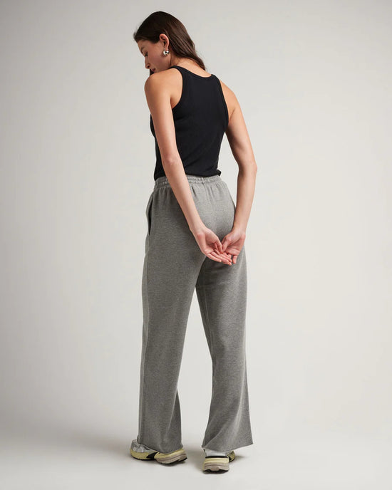 Back view of the the heather grey wide leg fleece pants from Richer Poorer
