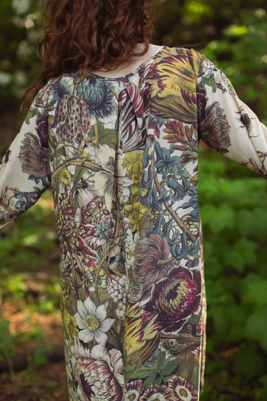 A dress with botanical prints that can be worn as a dress or long tunic