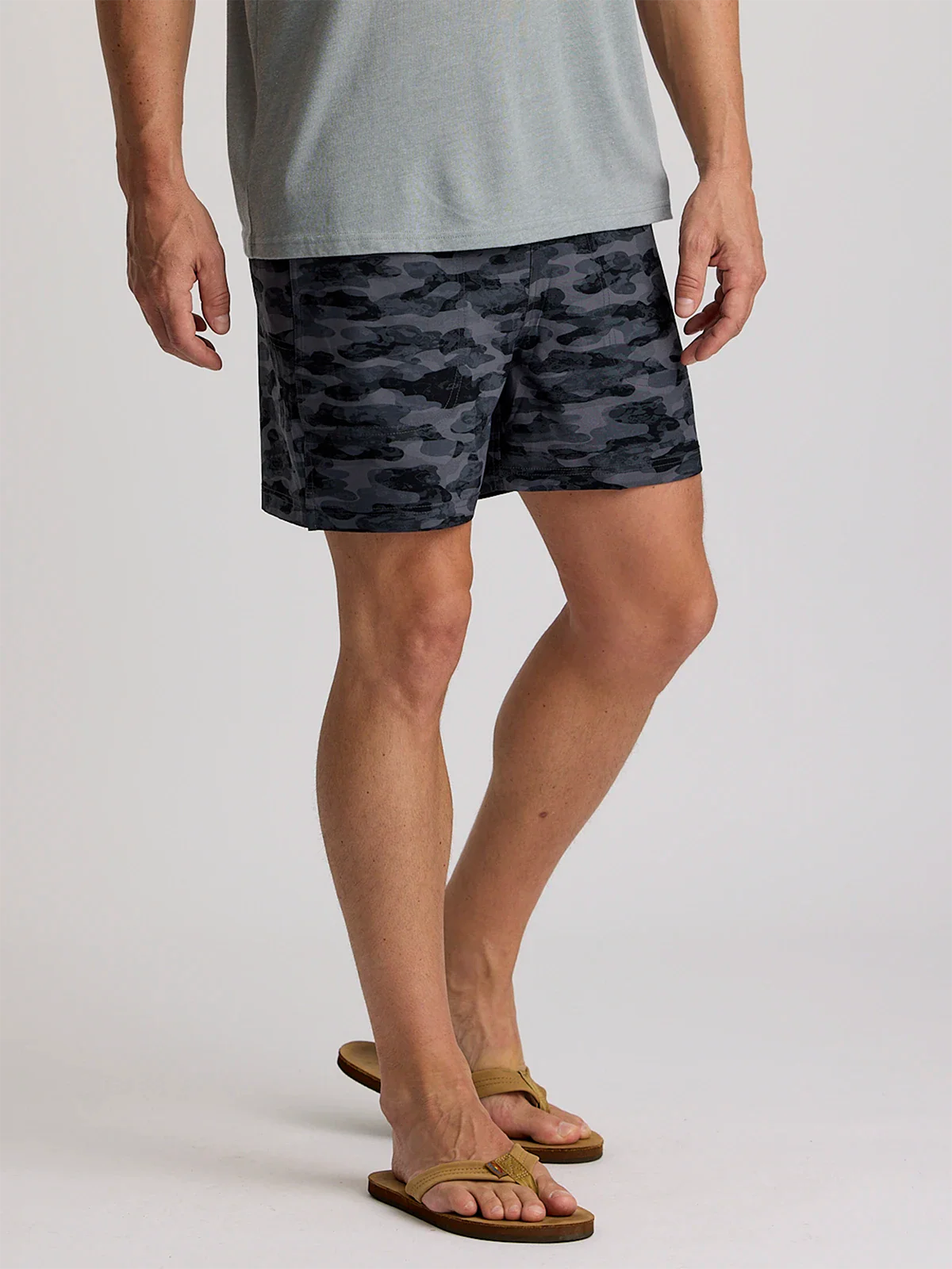 A man wearing the wearing the Free Fly Men's 5.5