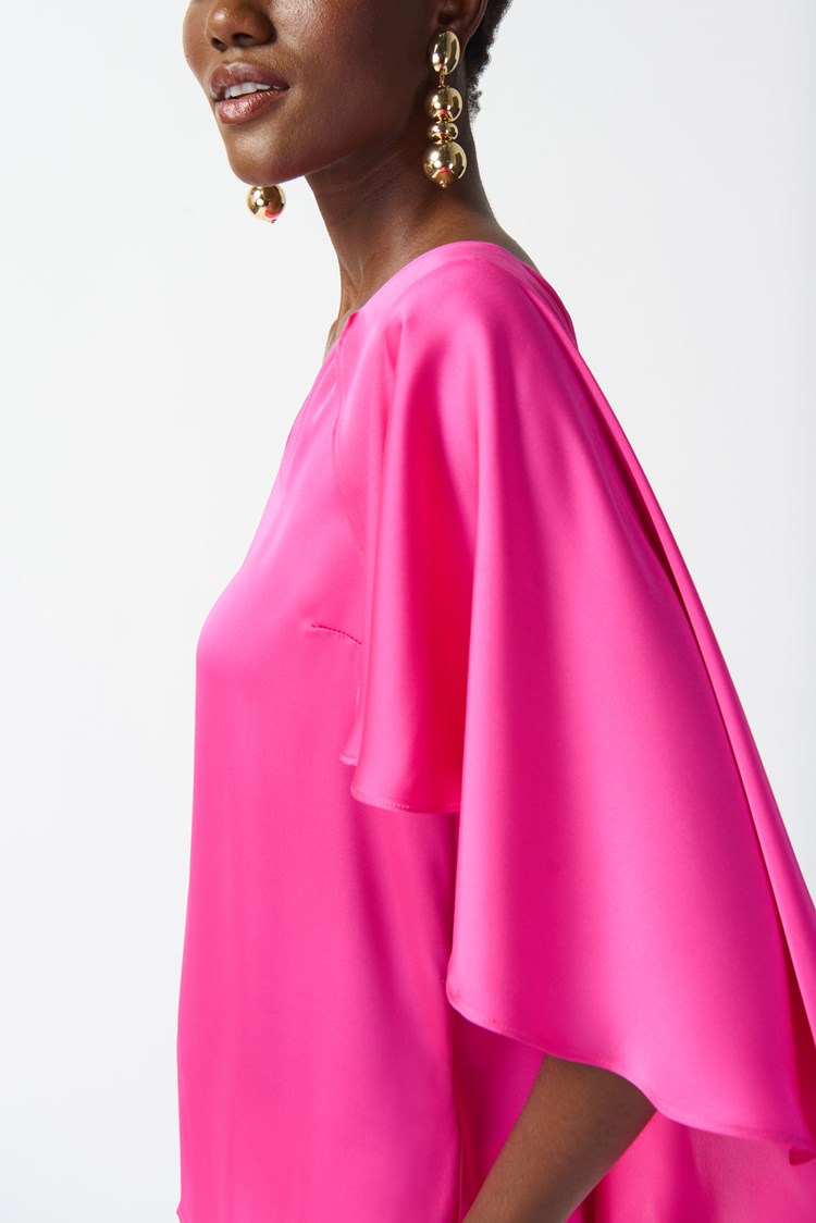 Side view of the Ultra Pink Satin Cape Top by Joseph Ribkoff