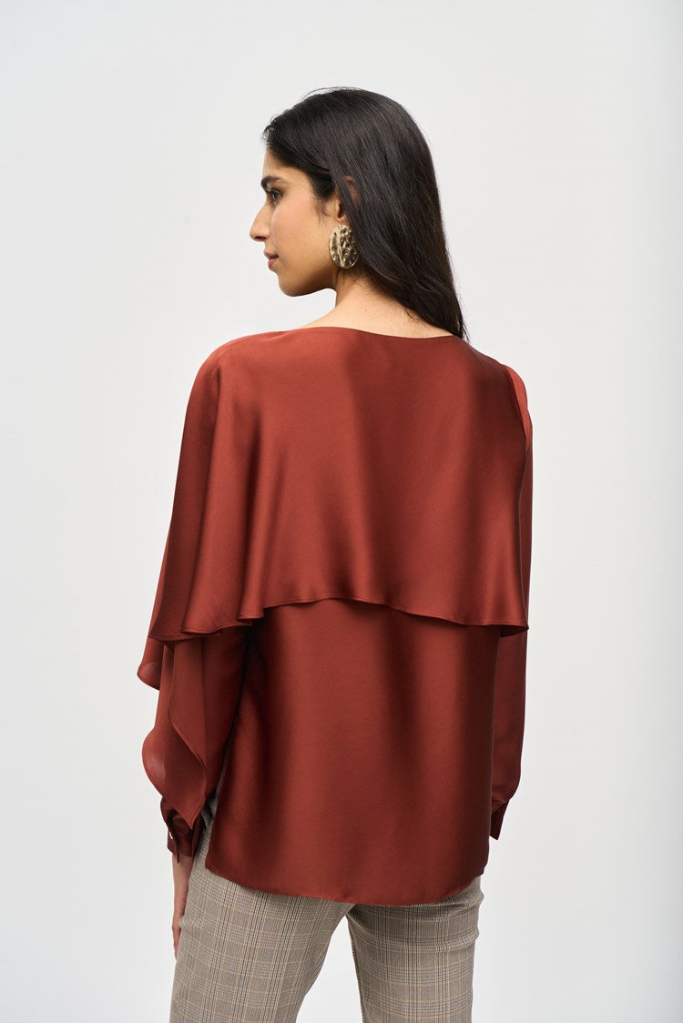 Back view of the Cinnamon Satin Flared Cape Top by Joseph Ribkoff