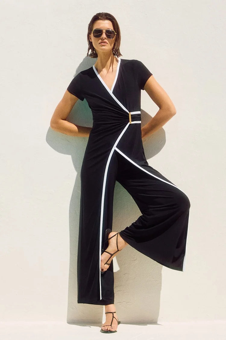 Joseph Ribkoff silky knit sleeveless jumpsuit with a wrap bodice and culotte legs, now available at Harbour Thread in Burlington, VT.