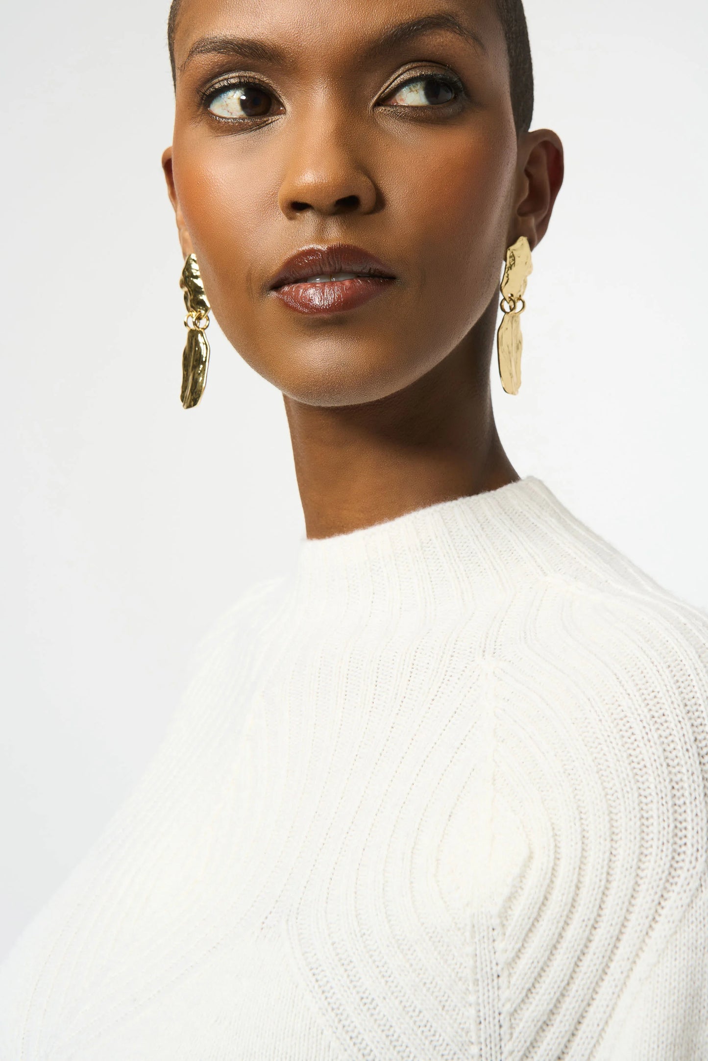 Women's white wool sweater with placement stitch detail