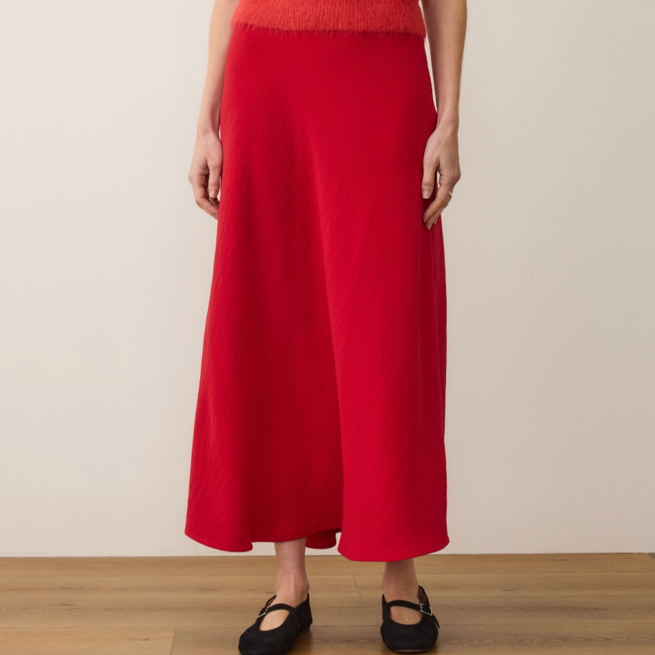 Person wearing a red skirt and red top from Marine Layer