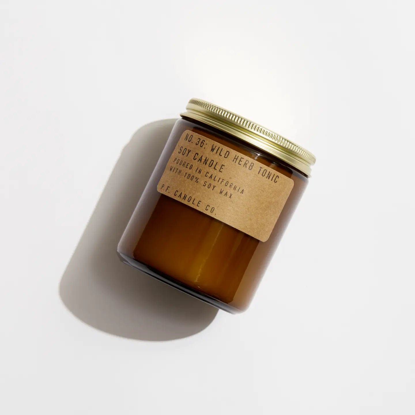 Shop the 7.2 oz P.F. Candle Co. Wild Herb Tonic Soy Candle at Harbour Thread boutique in Burlington, VT.