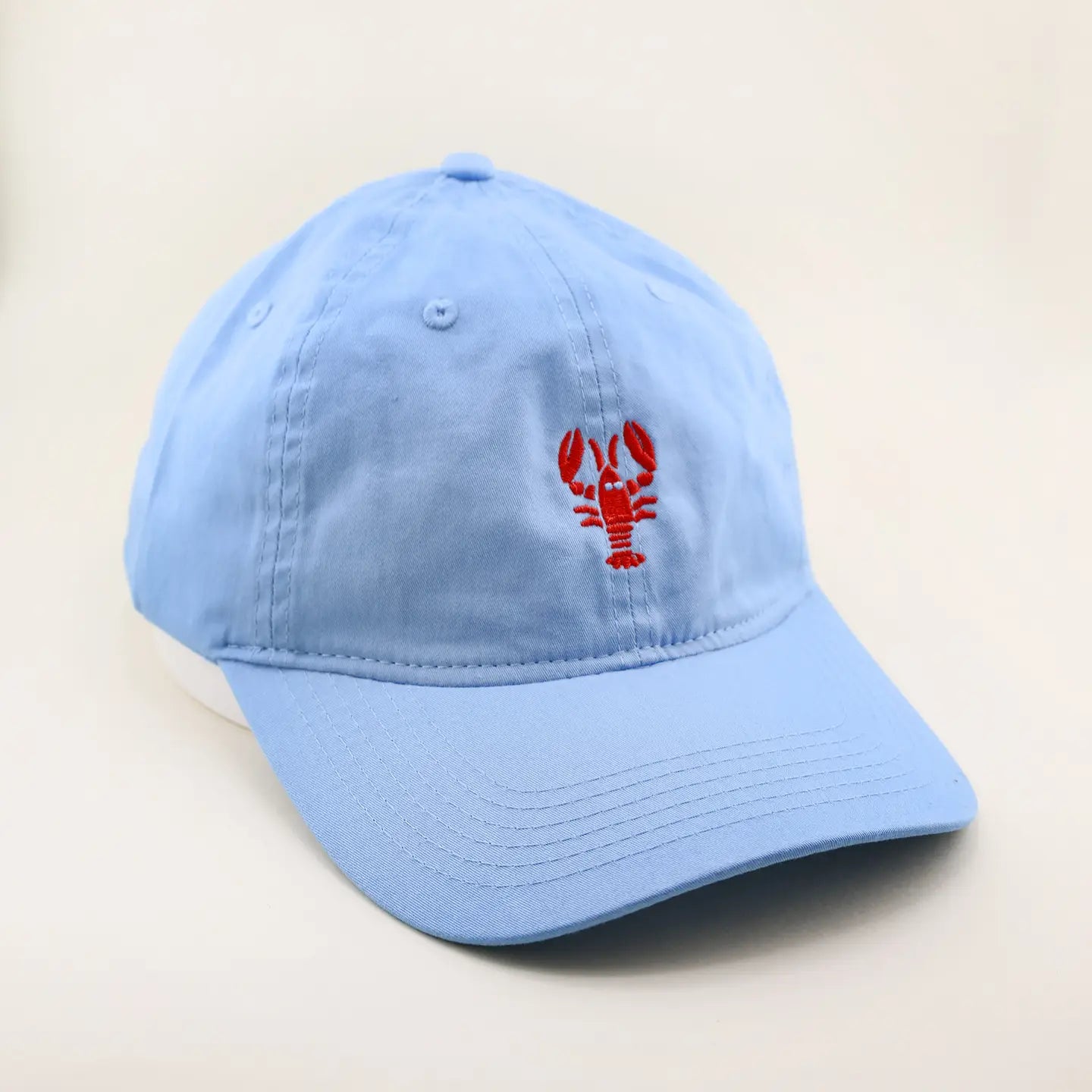 Top off your beach day look with the Freshwater Curated Goods Lobster Vintage Dad Hat at Harbour Thread women's boutique in St. Petersburg, FL.