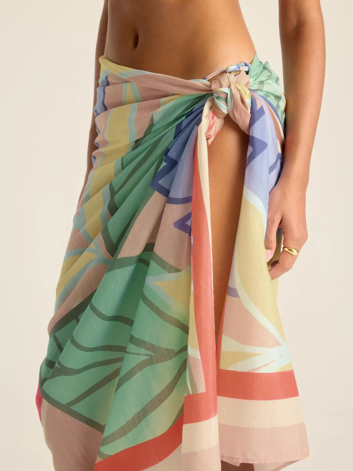 The Vitamin A Samara Sarong is crafted from an airy and breathable silk alternative fabric