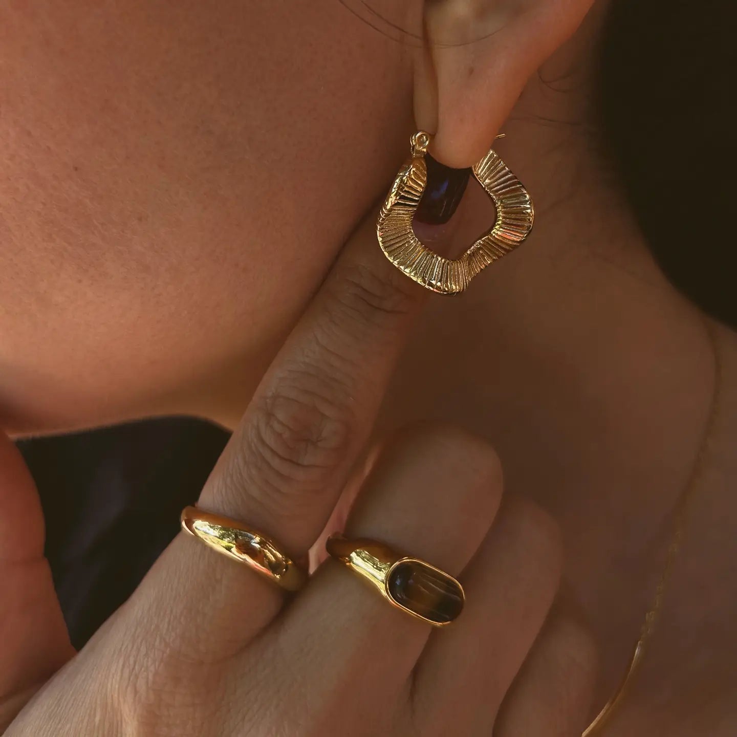 The Boem Collection Lyra Hoops are 18K Gold Plated over Stainless Steel for tarnish-resistant wear