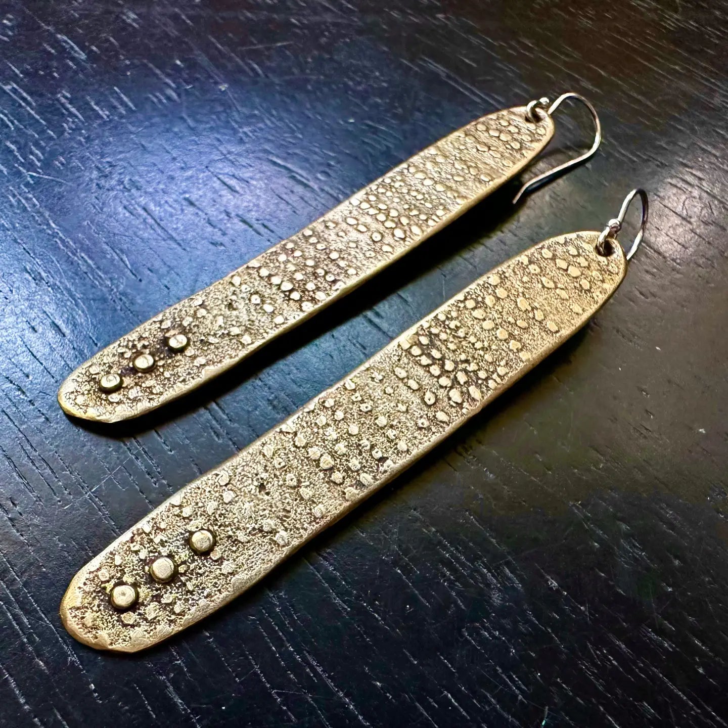 Shop the Long Relic Earrings in Brass by local Vermont maker Jennifer Kahn Jewelry at Harbour Thread women's boutique in Burlington, VT.