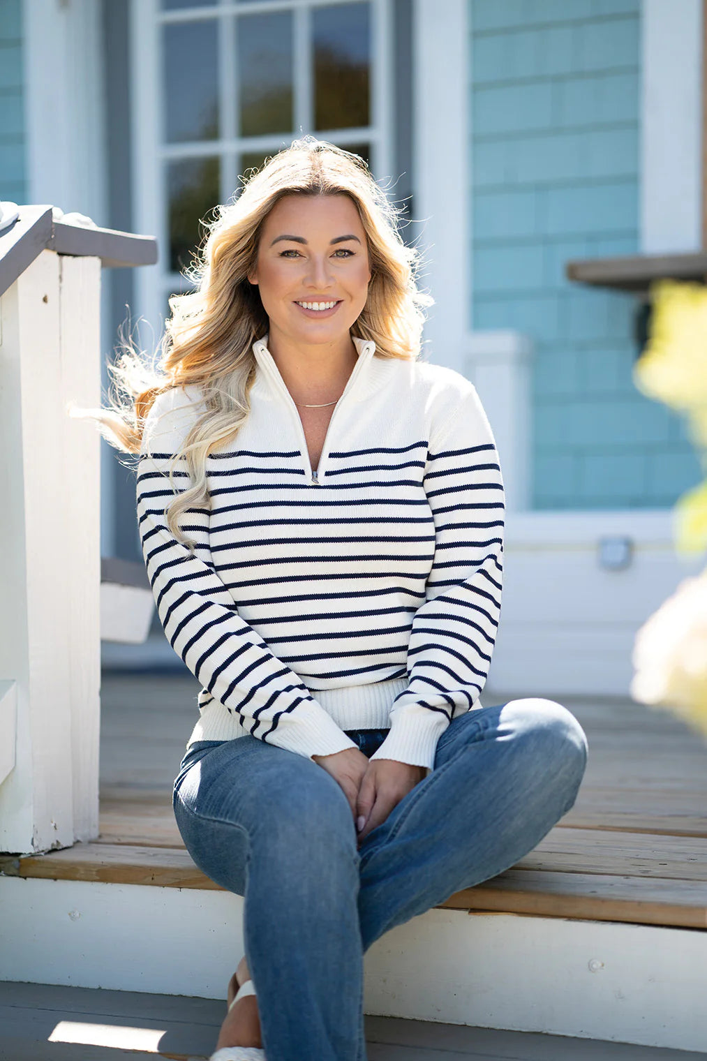 This striped quarter zip women's sweater from Long Wharf Supply is perfect for chilly days.