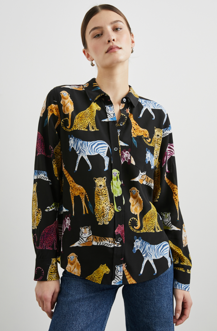 This long sleeve washed silk button down features an eclectic multicolor animal design