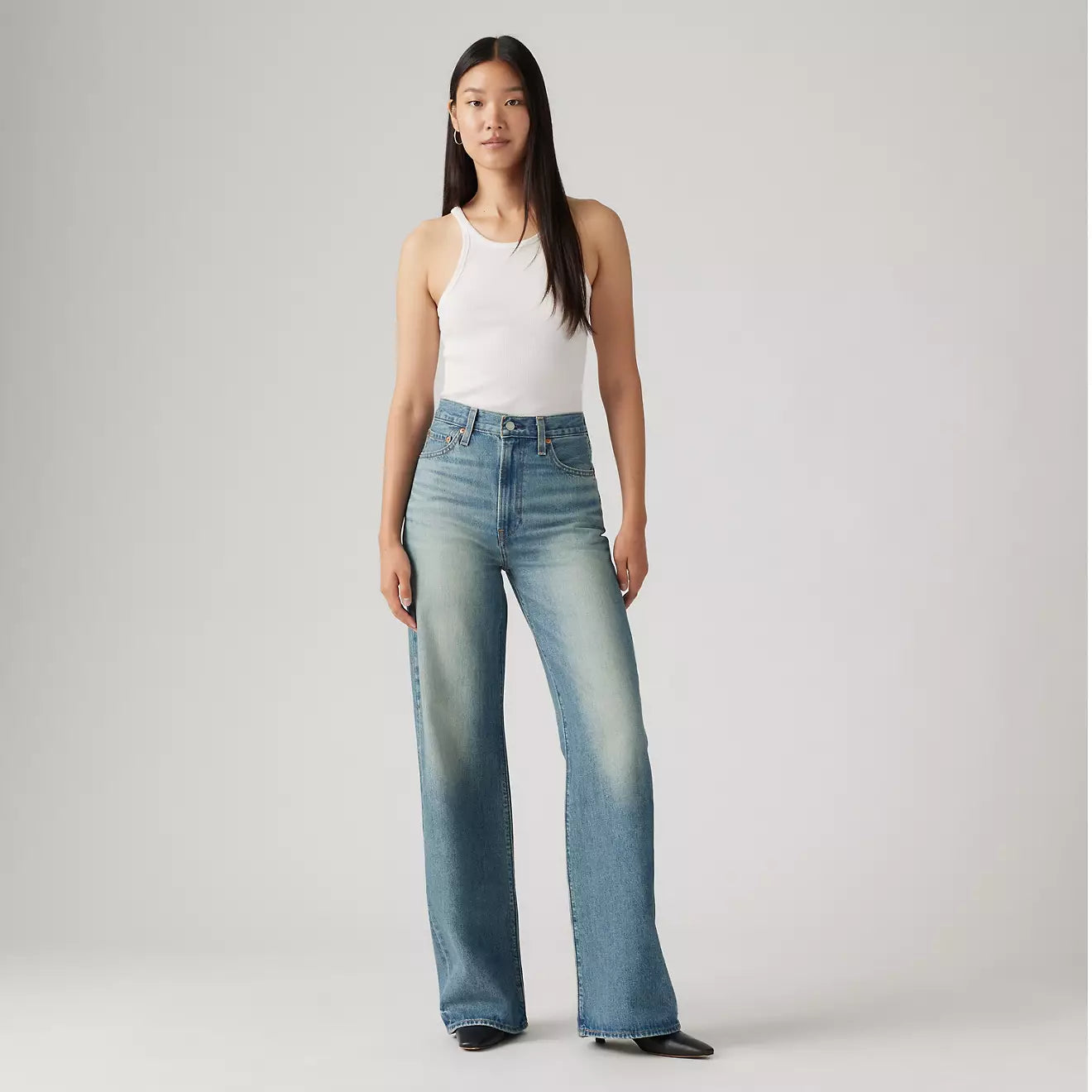 The Levi's Ribcage Wide Leg Women's Jeans are available at Harbour Thread in the medium wash color Tint Story