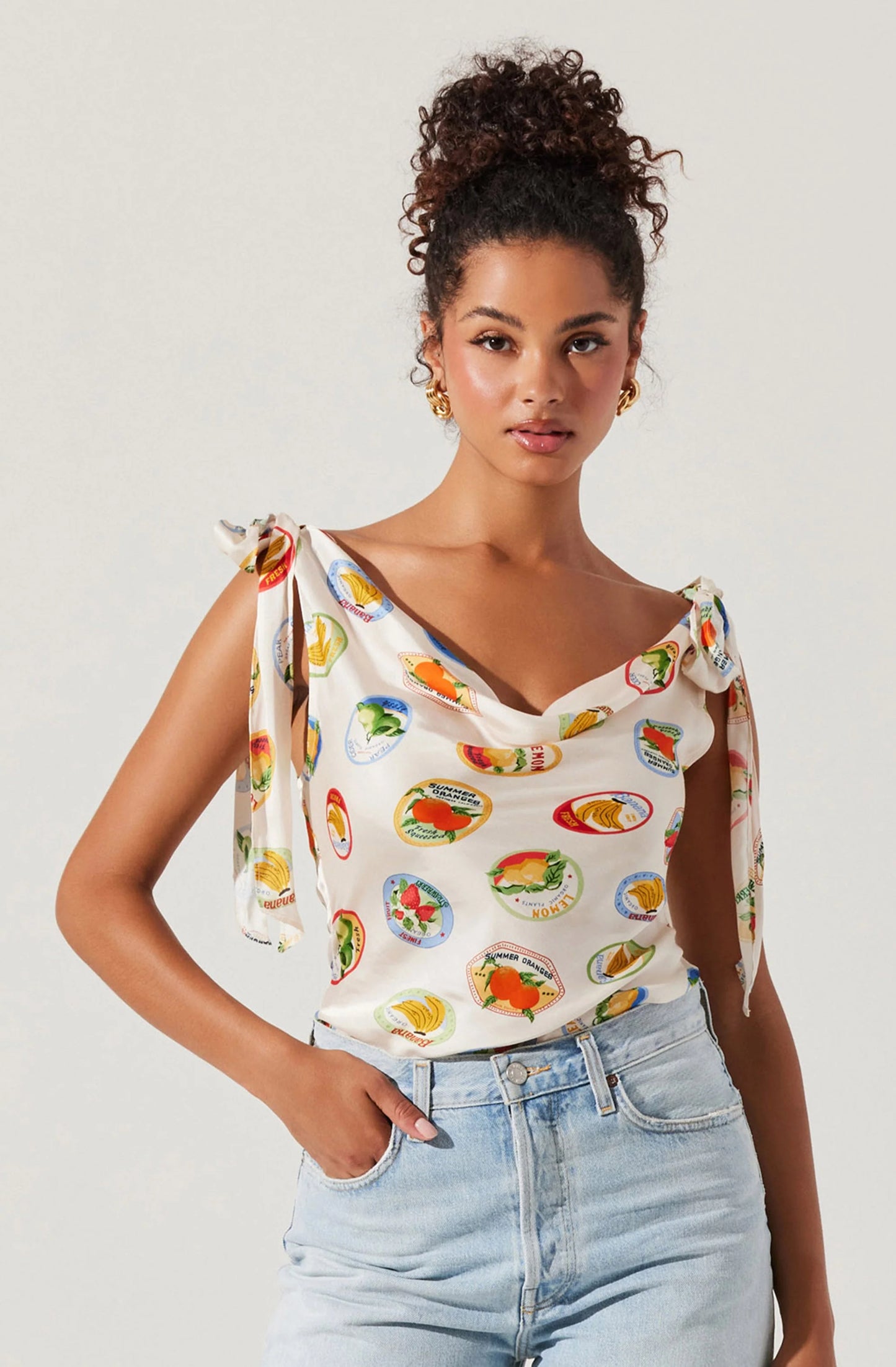 Embrace fun, feminine style with the Allexina Satin Tie-Shoulder Top from ASTR. Elevate your casual summer style at Harbour Thread in St. Pete, FL!