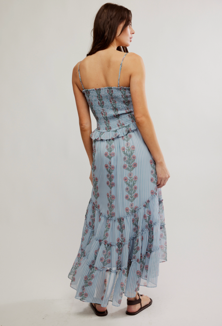 The Free People Alejandra Midi Dress offers a dropped-waist seam and tiered skirt design