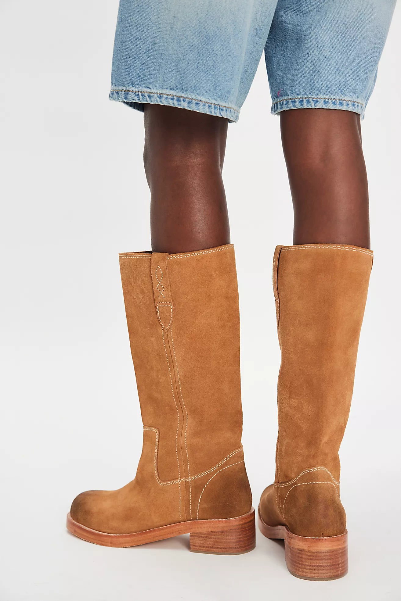These vintage-inspired suede pull-on boots from Free People offer endless ways to style throughout the season