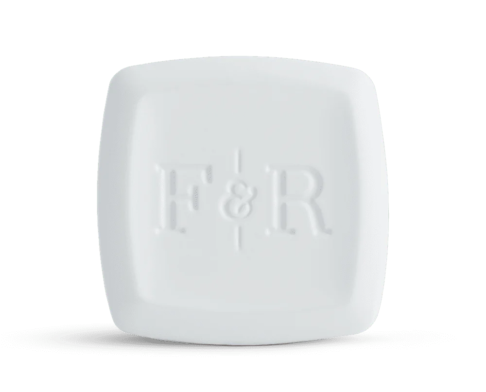 The Cloudland .2 oz solid fragrance by Fulton & Roark offers an intimate blend of earth and summer rainfall.