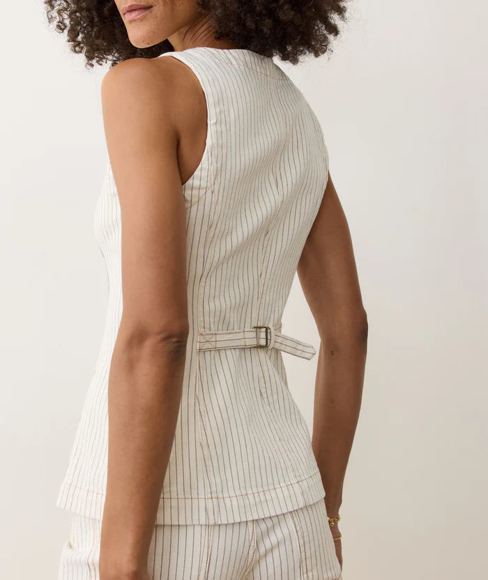 The Marine Layer Charlie Longline Vest features a fitted silhouette with back cinching detail