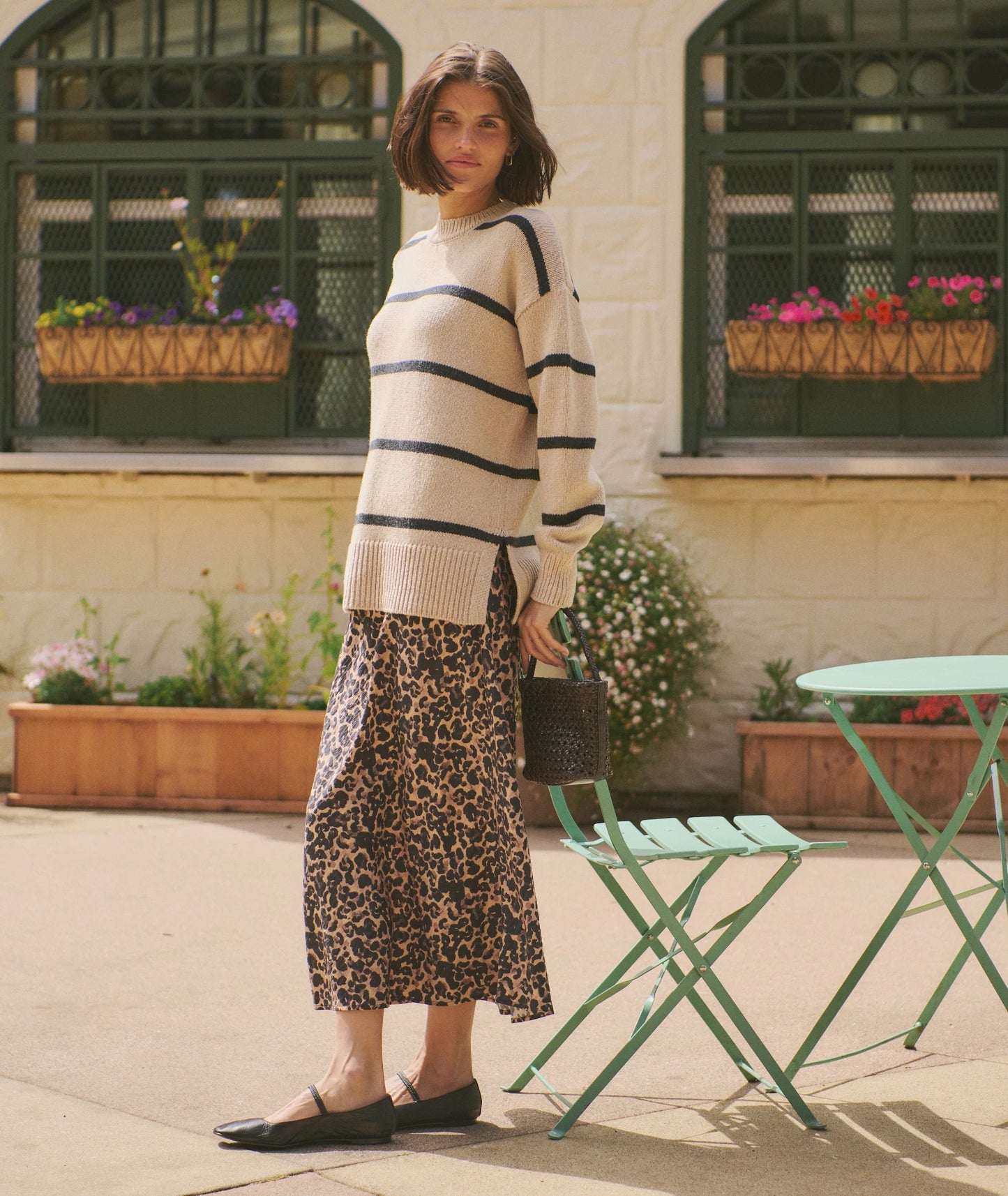Add some playful energy to your fall looks with the leopard print Avery Midi Skirt, available at Harbour Thread boutique.