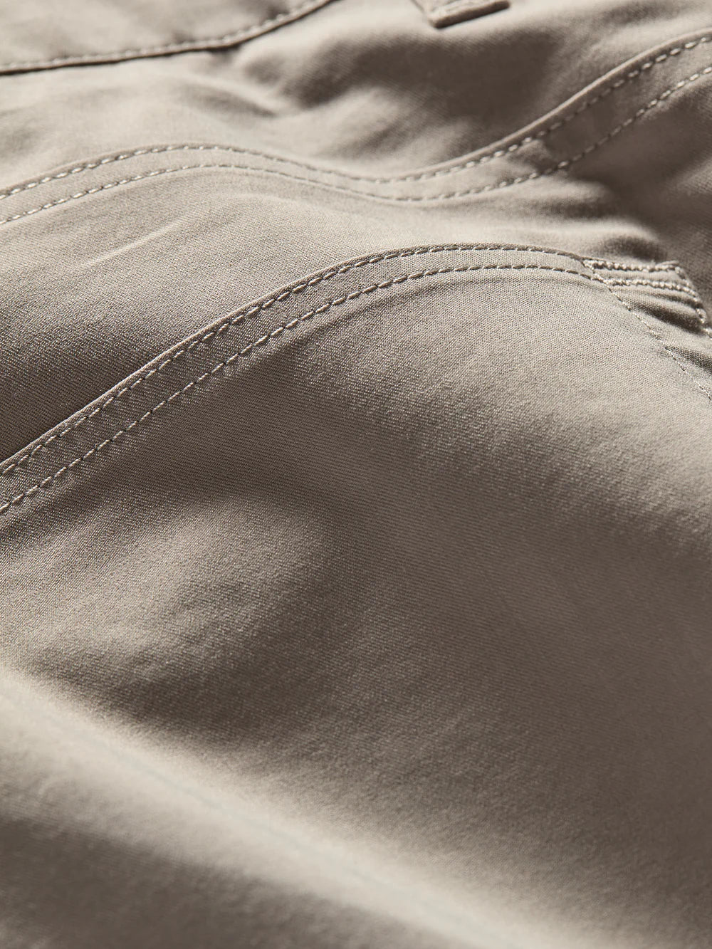 Seaming detail on the men's Movement 5-Pocket Pant by Faherty, in the color Fossil