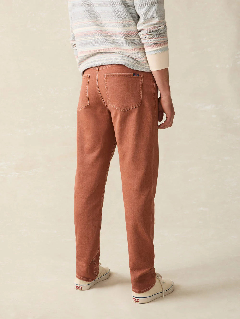 Back view of Faherty's Stretch Terry 5-Pocket Men's Pant in the color Russet