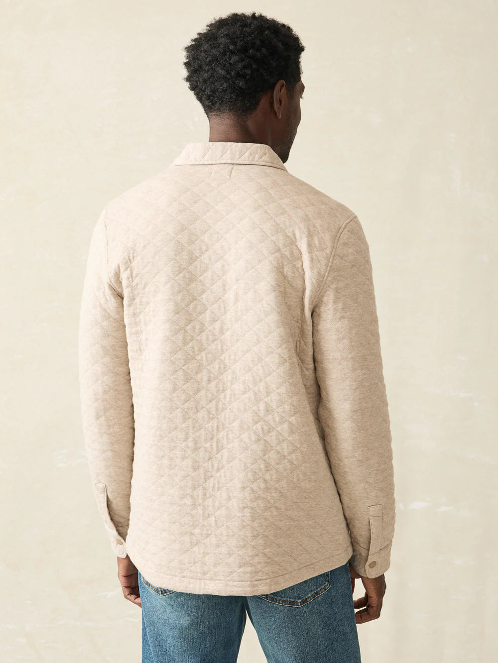 Back view of the Oatmeal Melange  Epic Quilted Fleece CPO by the brand Faherty