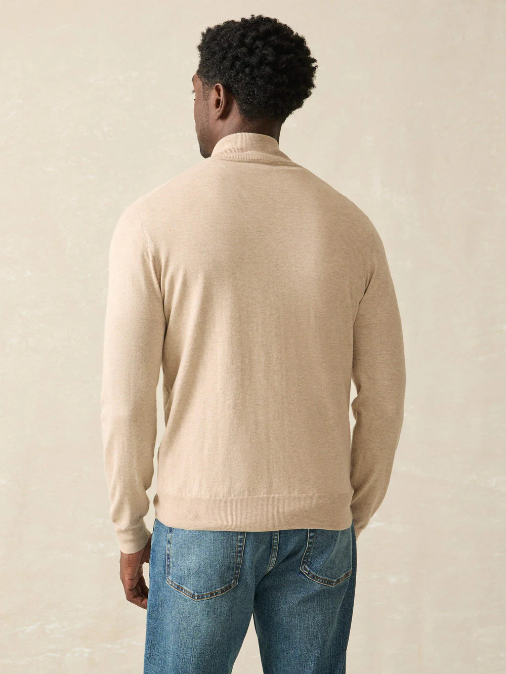 Back view of Faherty's Men's Movement Quarter Zip in the color Soft Dune Heather