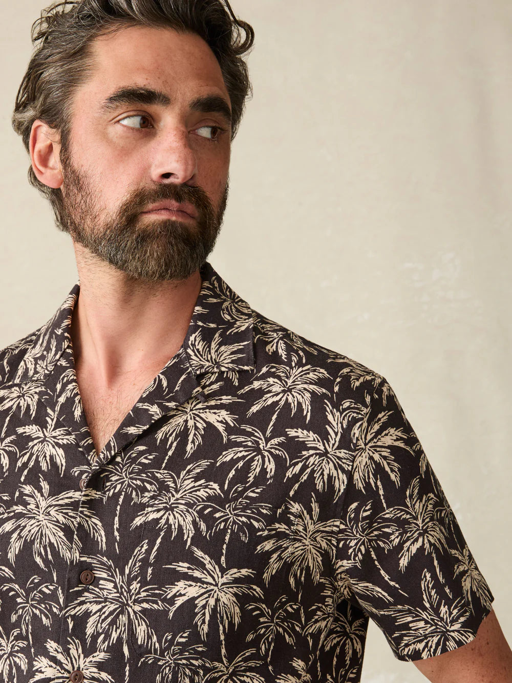 Front design detail on the Charcoal Tropic Trees Short Sleeve Hemp Blend Camp Shirt by Faherty