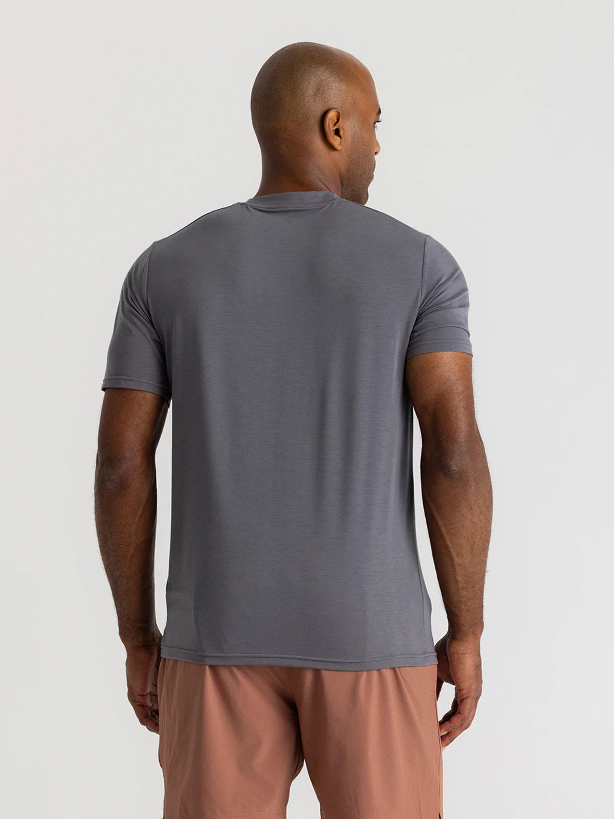 The Free Fly Men's Elevate Lightweight Tee is crafted from quick drying, odor control fabric