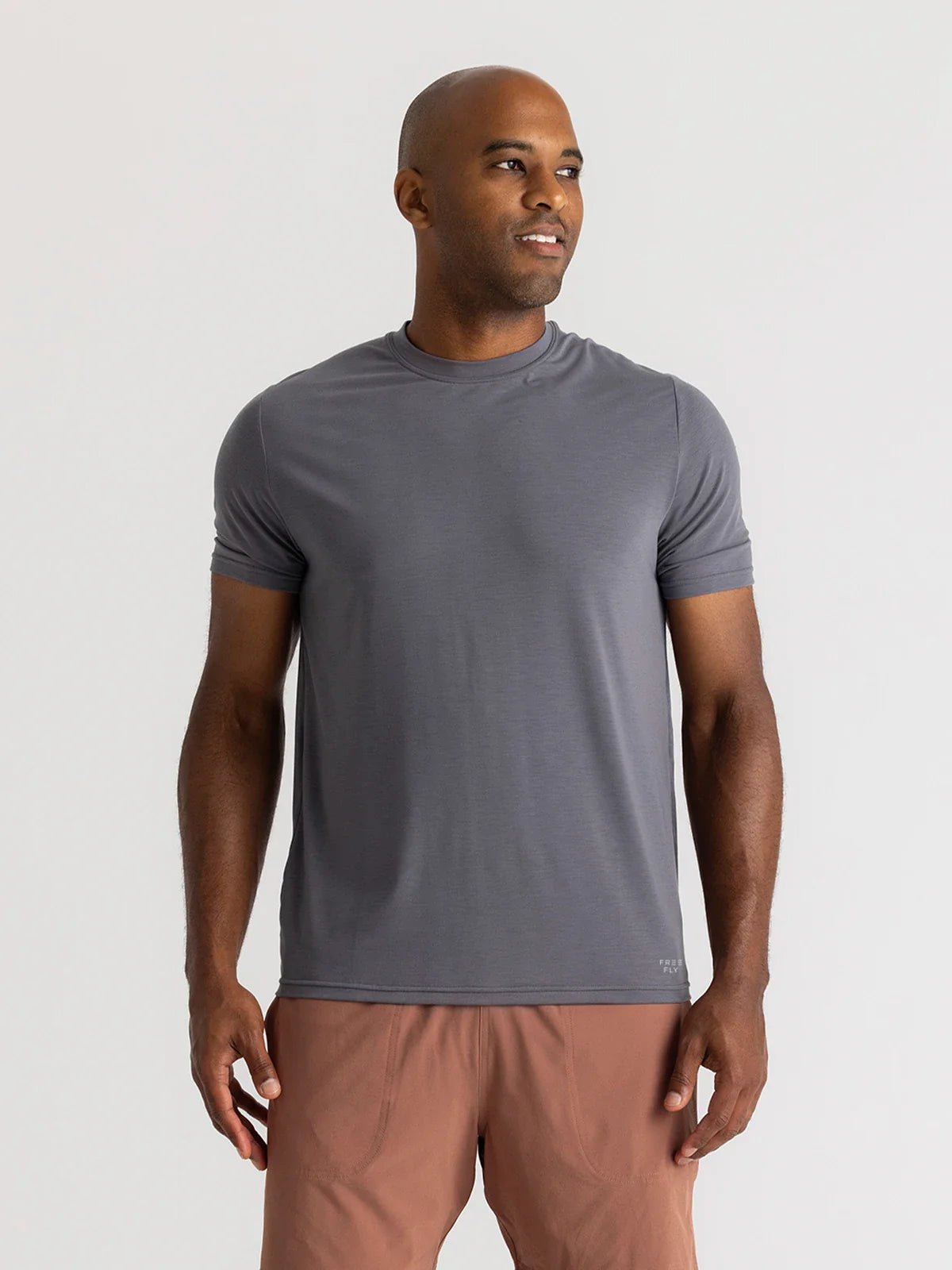 Shop the Free Fly Men's Elevate Lightweight Tee in Smoke at Harbour Thread men's store in St. Petersburg, FL.