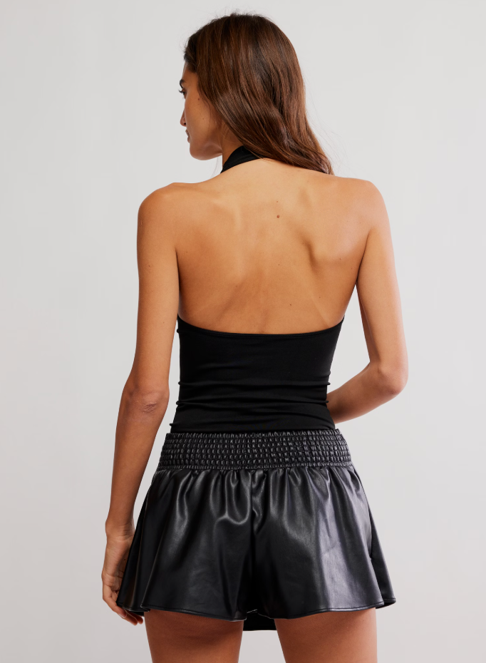 The Free People So Sleek Cami has a form fitting, seamless design with an open back