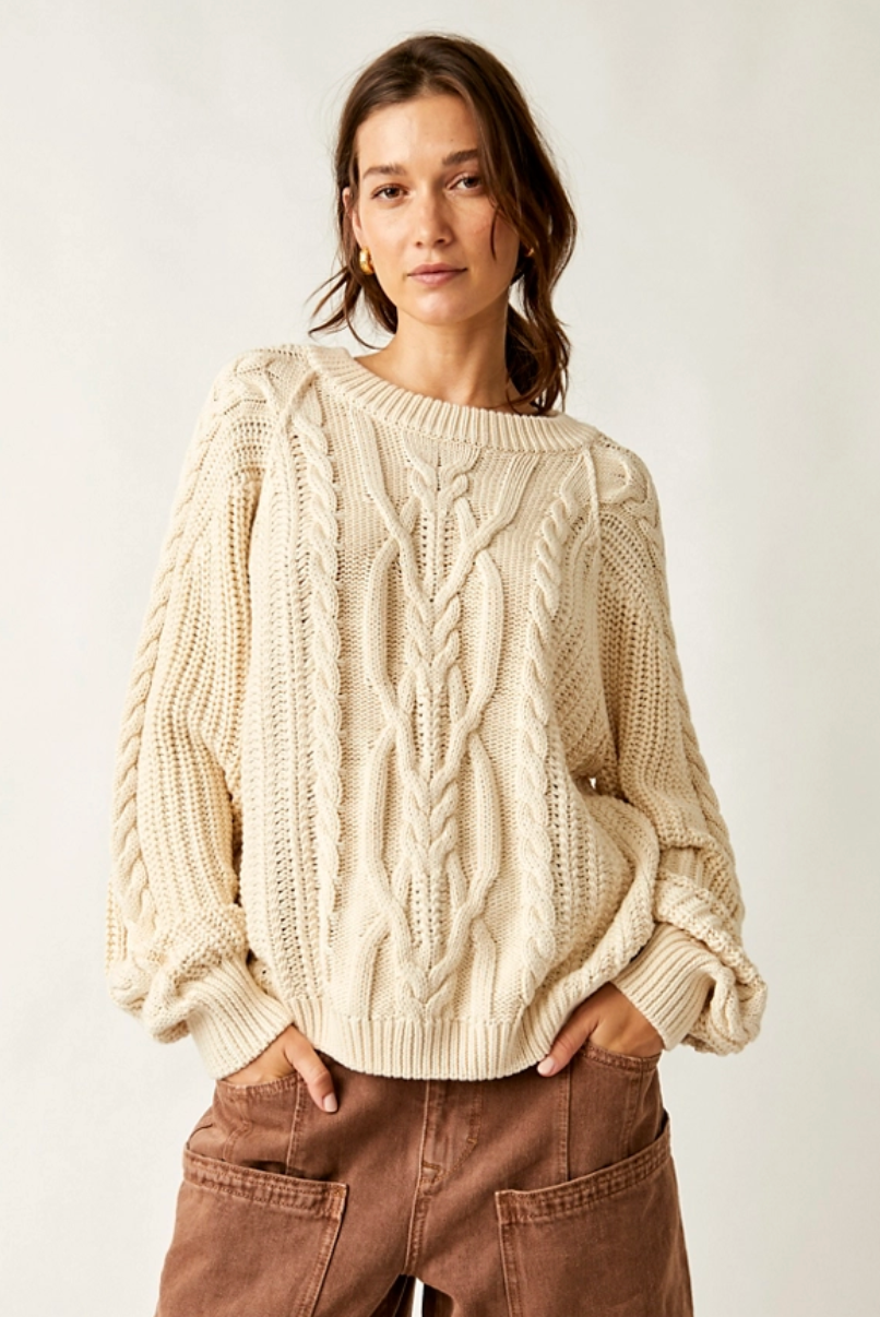 The Frankie Cable Sweater offers timeless style during the cold weather months. Find yours at Harbour Thread boutique in Burlington, VT!