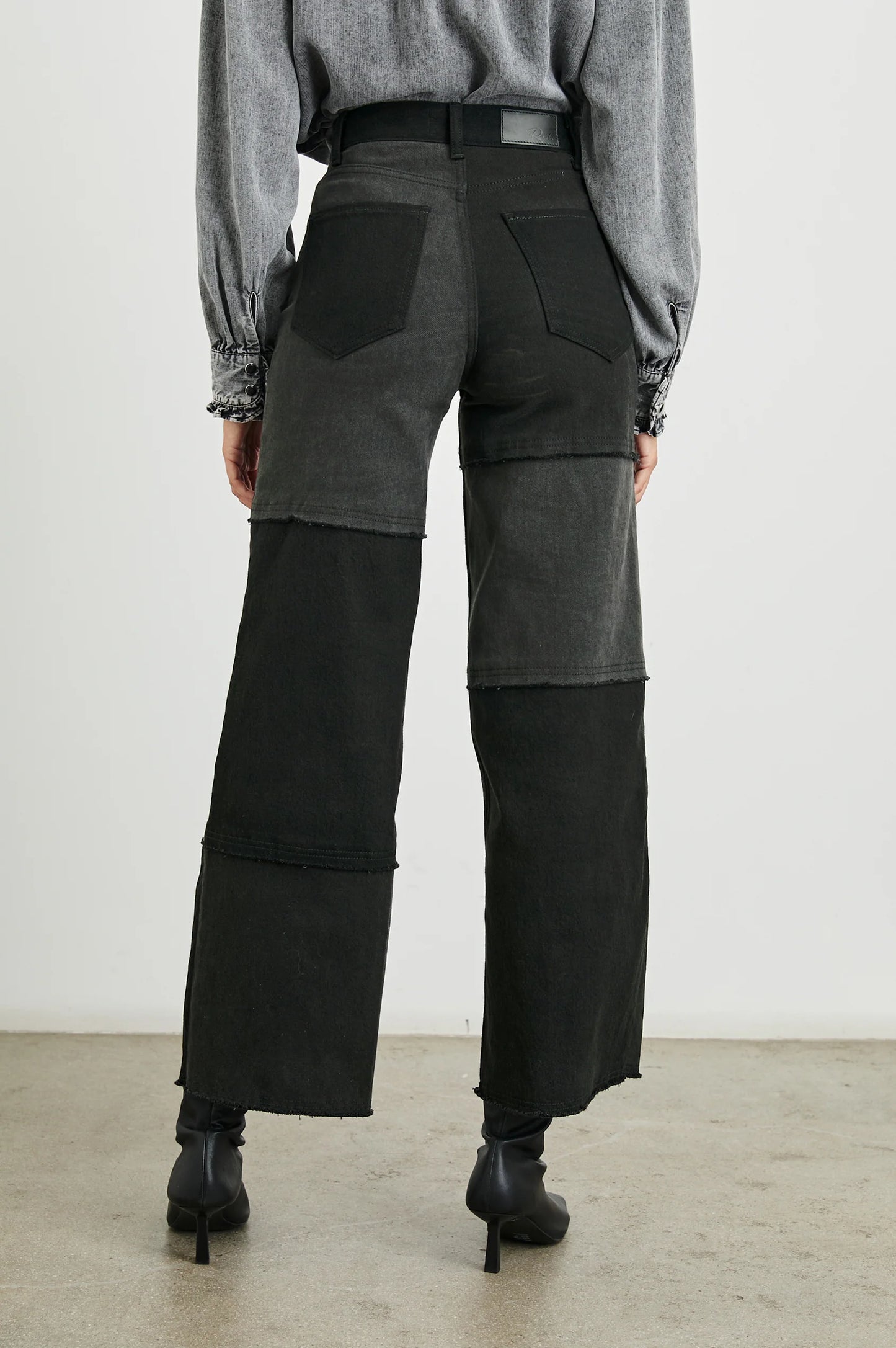 These black patchwork women's jeans from Rails offer a flattering high waisted fit and unique style.