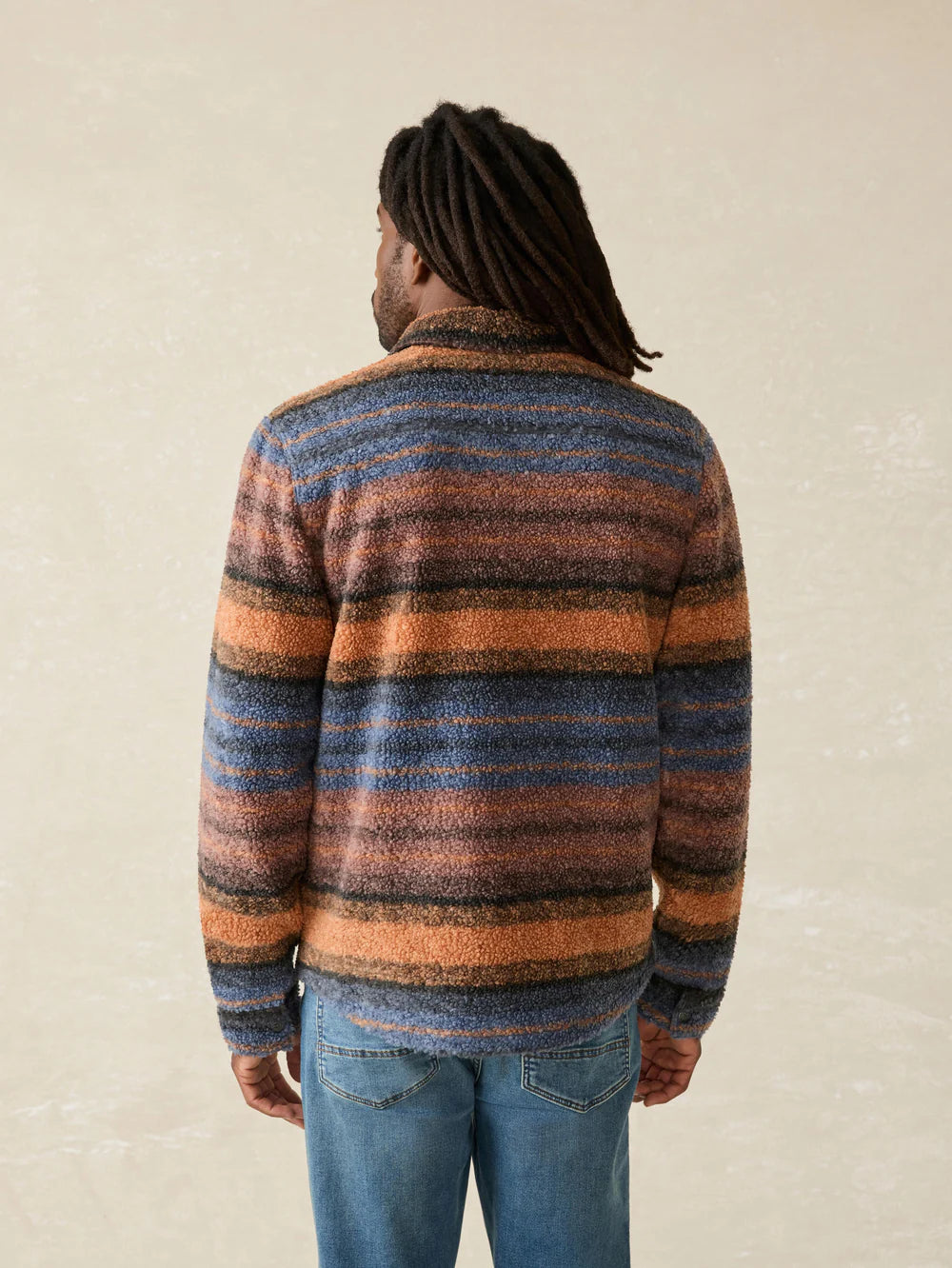 Faherty's Range Fleece CPO features a multicolor earthtone stripe design