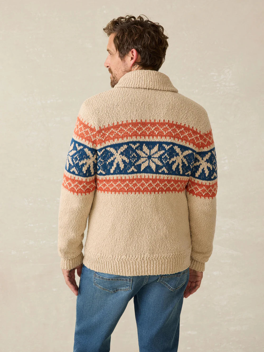 Back view of a man wearing Faherty's Surf To Snow Zip Cardigan