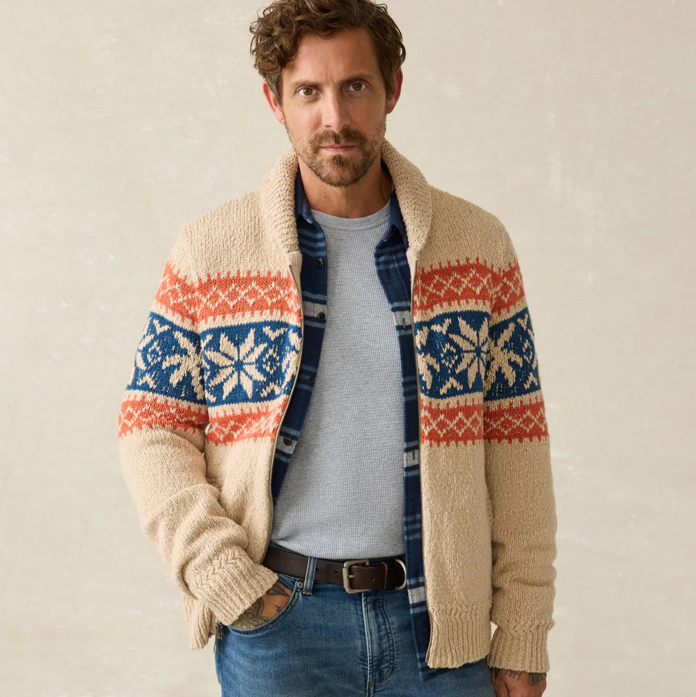 A man wearing Faherty's Surf To Snow Zip Cardigan