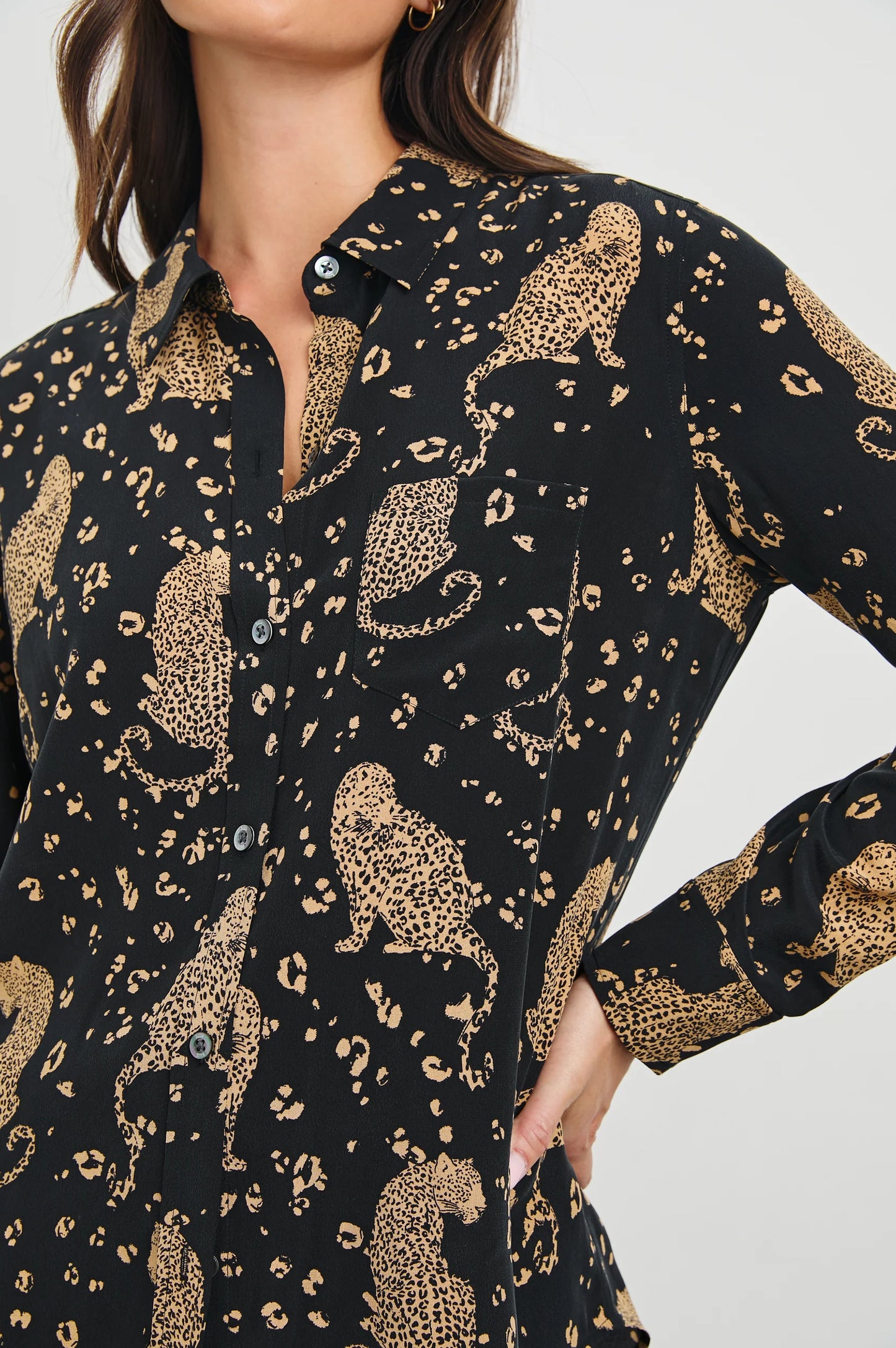 Women's washed silk button down shirt with a leopard print throughout