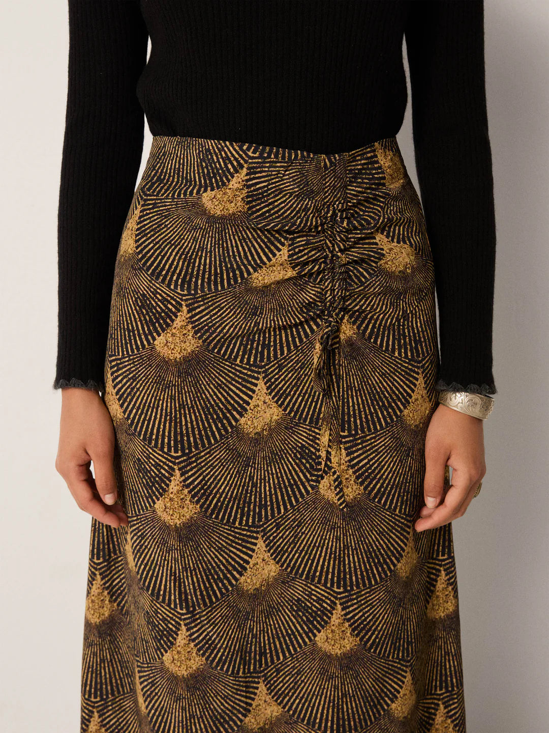 Patterned skirt with adjustable tie details