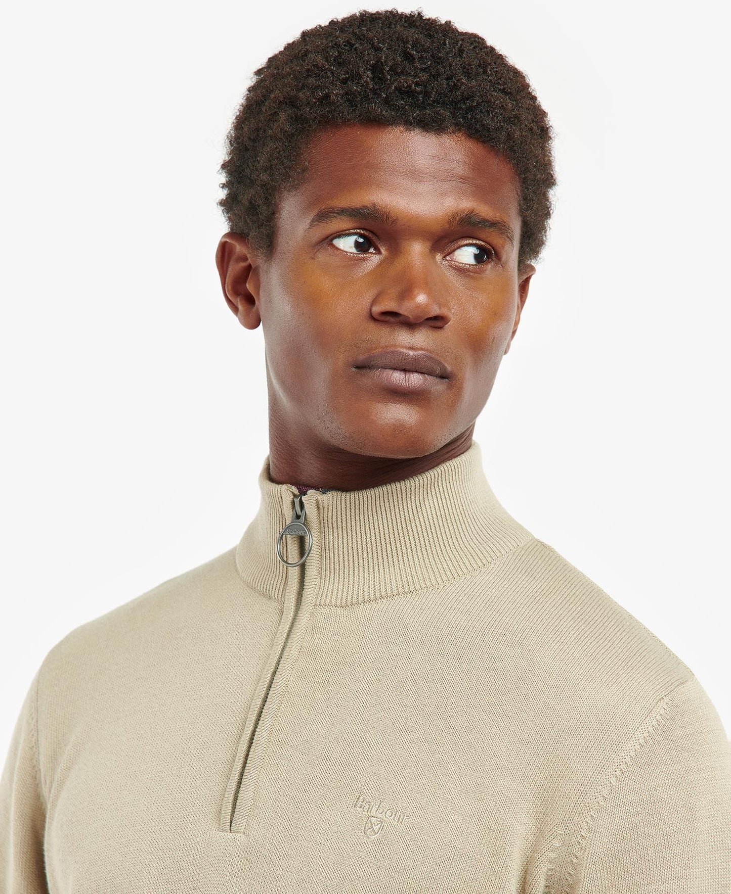 Closeup top front detail view of the Washed Stone color Cotton Half Zip Pullover by Barbour