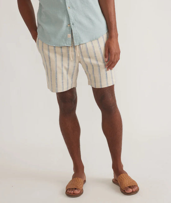 Front view of the Marine Layer 6" Saturday Selvage Beach Short in the color Natural/Blue Stripe